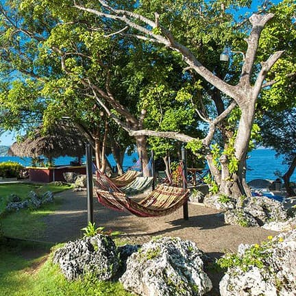 Hangmatten in Hotel Casa Marina Reef in Sosua, Dominicaanse Republiek