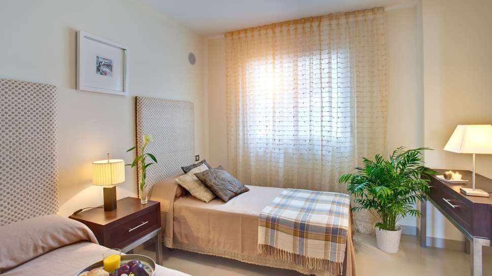 Slaapkamer van appartement in Cortijo del Mar Resort in Estepona, Costa del Sol, Spanje