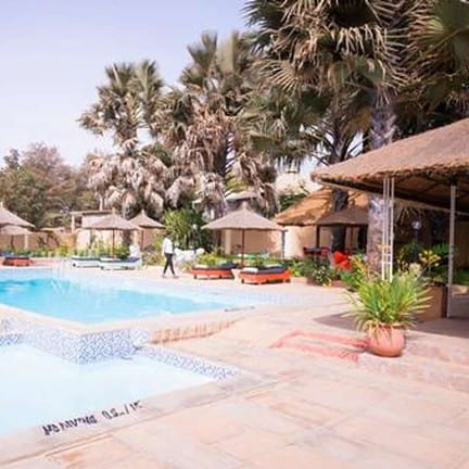 Zwembad van Calabash appartementen in Kotu, Gambia