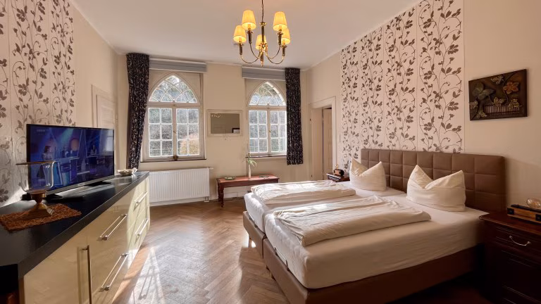 Haus Hohenzollern en Haus Ambiente Hotelkamer Haus Hohenzollern en Haus Ambiente Hotelkamer